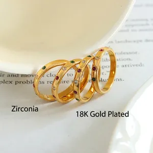 Set of four 18K gold plated stainless steel rings with colorful zircon starburst inlay