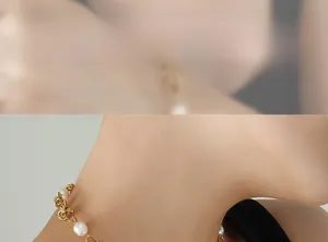 Detail of baroque freshwater pearls and gold-plated chain links on the necklace