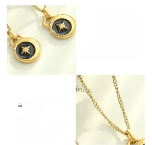 Close-up of gold-plated titanium steel necklace with black enamel star pendant