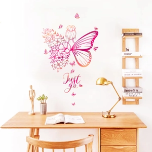Detail des kreativen Schmetterling-Mädchen-Wandstickers mit Blumen und Text