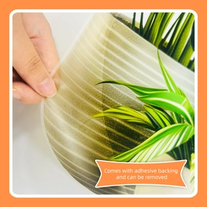 Detail of self-adhesive plant wall sticker showing easy peel-off backing and stripe texture