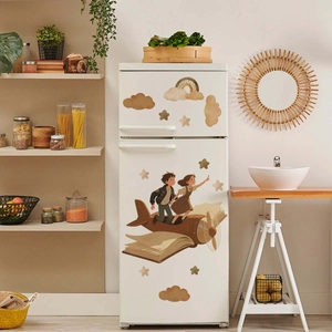 Detail of vintage cartoon wall stickers with kids on a book plane over white fridge