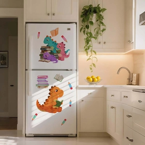 Detail of colorful cartoon dinosaur wall stickers on a white kitchen refrigerator