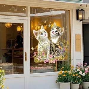 Golden edge floral cat window clings showing kittens and butterflies on glass