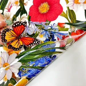 Detail of static cling window film with double-sided colorful floral patterns and butterfly