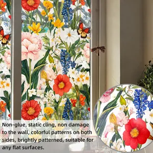 Detail of static cling window film with colorful flowers and butterflies on glass