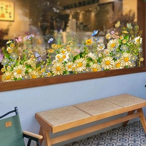 Detailed watercolor floral window decals with colorful daisies and butterflies on glass