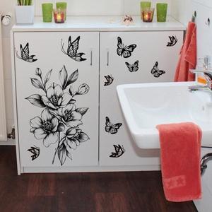 Black line art floral and butterfly wall stickers on white bathroom cabinet decoration