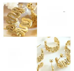 Detailed view of golden brass C-shaped earrings with unique geometric wave texture