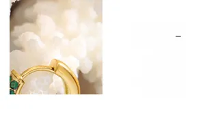 Detail of 18K gold plated titanium earring featuring an inlaid green zircon stone