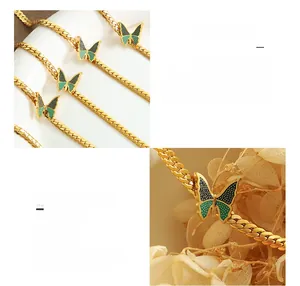 Detail der 18K vergoldeten Edelstahl-Schlangenkette mit grünem Schmetterlingsanhänger