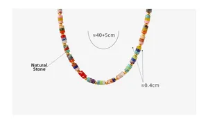 Detail of colorful natural stone beaded necklace with gold spacers and 40+5cm chain