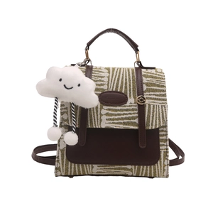 Retro plaid crossbody bag with yellow-green woven texture and plush cloud charm accessory