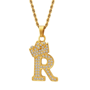 Golden crown letter R pendant necklace with zircon pavé setting on a rope chain