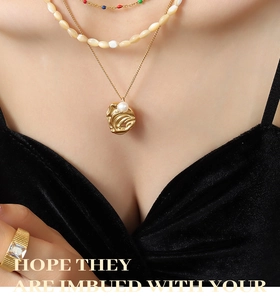 Detailed layered necklace set with gold pendant, pearls and square zircon ring
