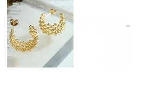 Detailed close-up of 18K gold plated titanium mesh hoop earrings with beaded C-shape design