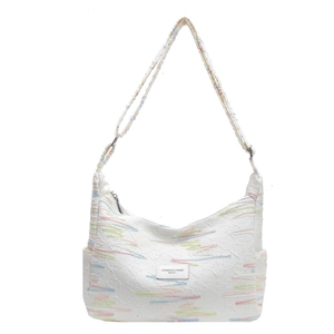 White canvas crossbody bag with colorful wave embroidery and adjustable shoulder strap