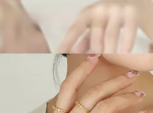 Detail showing sparkling geometric cubic zirconia inlay on a thin gold hip-hop ring