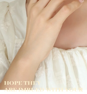 Detailed view of white jacquard fabric with elegant floral embroidery and relief texture