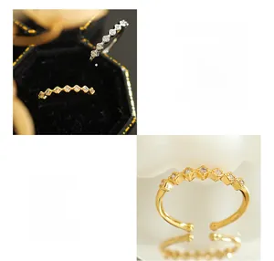 Macro detail of geometric brass ring with cubic zirconia and adjustable open band