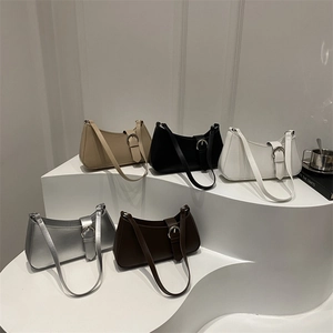 Collection of minimalist vintage shoulder bags in five colors with adjustable metal straps