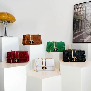 Vintage crocodile embossed leather handbags in multiple colors with gold chain straps