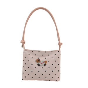 Sac à épaule rose à pois en toile avec broderie en peluche d'un chiot mignon