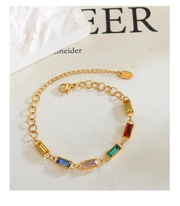 Detail of 18K gold bracelet featuring six rectangular multi-colored crystal rhinestones