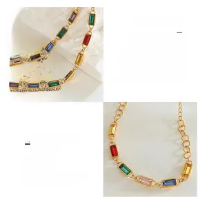 Detailed macro view of 18K gold plated titanium steel chain with colorful rhinestones