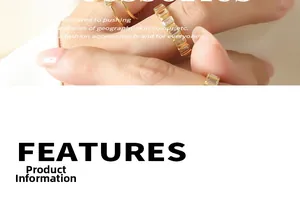 Close-up of gold layered chain necklace with baguette-cut clear zircon stones