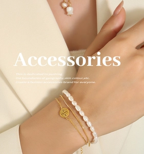 Three-layer layered bracelet set featuring natural pearls and a gold longevity charm