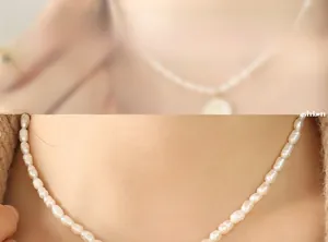 Close-up of baroque freshwater pearl necklace showing natural texture and soft luster