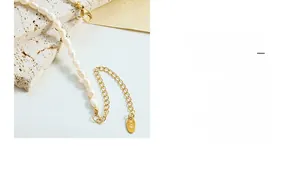 Detailed macro view of freshwater pearl necklace with 18K gold clasp and K18 engraving