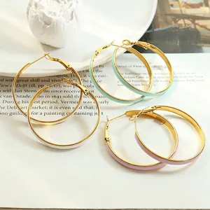 Three pairs of elegant titanium steel hoop earrings with colorful enamel oil drip coating