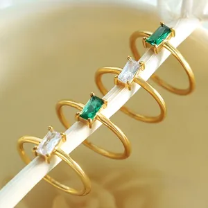 Minimalist titanium steel gold ring set with emerald green and clear square zircon stones