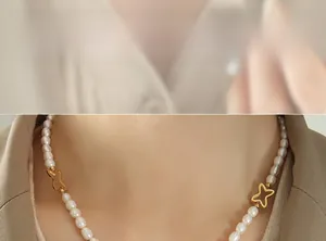 Primo piano di una collana di perle d'acqua dolce con accenti a stella dorati