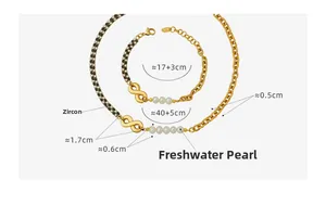 Detail of infinity charm necklace and bracelet set with black white zircon and pearls