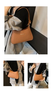 Detail of brown baguette bag with V-shaped quilting and knotted leather shoulder strap