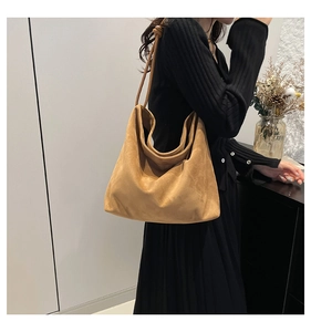Brown large capacity suede tote bag showing natural drape and long leather straps