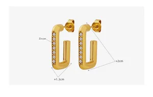 Dettaglio orecchini vintage a U in oro con zircone, larghezza 1,3 cm e altezza 2 cm