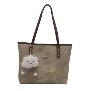 Borsa tote in tela minimalista con manici in pelle e ciondolo a nuvola morbida