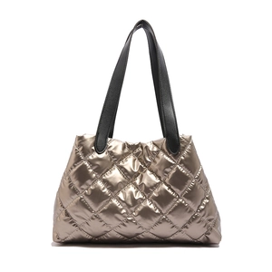 Golden brown quilted down tote bag with metallic sheen and black long shoulder straps