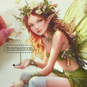 Detail of glow in the dark butterfly fairy wall sticker being peeled from the sheet