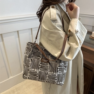 Women's vintage geometric canvas tote bag with brown leather straps and large capacity