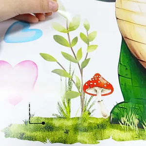 Detail of self-adhesive cartoon wall sticker showing easy peel-off backing and glue texture