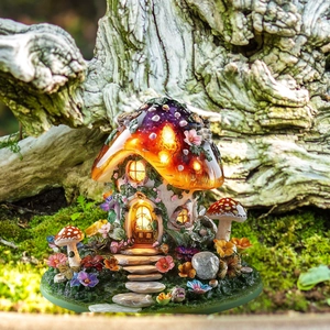 Luminous fairy mushroom house garden stake with glowing resin roof and floral details