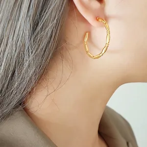 Chic 18k gold plated stainless steel C-shaped hoop earrings with bamboo texture design
