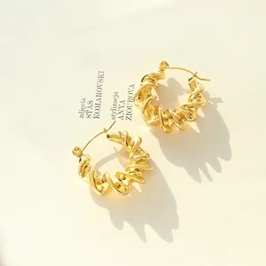 Twisted 18K gold plated titanium C-shape hoop earrings with vintage texture