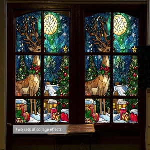 Detail of Christmas window clings with reindeer and tree in stained glass style