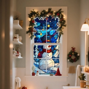 Close-up of a snowman window sticker with colorful stained glass art and warm holiday lights